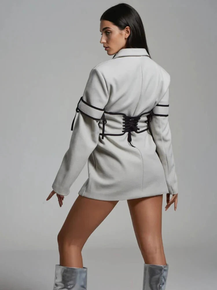 Långärmad jacka med knappar och korsett