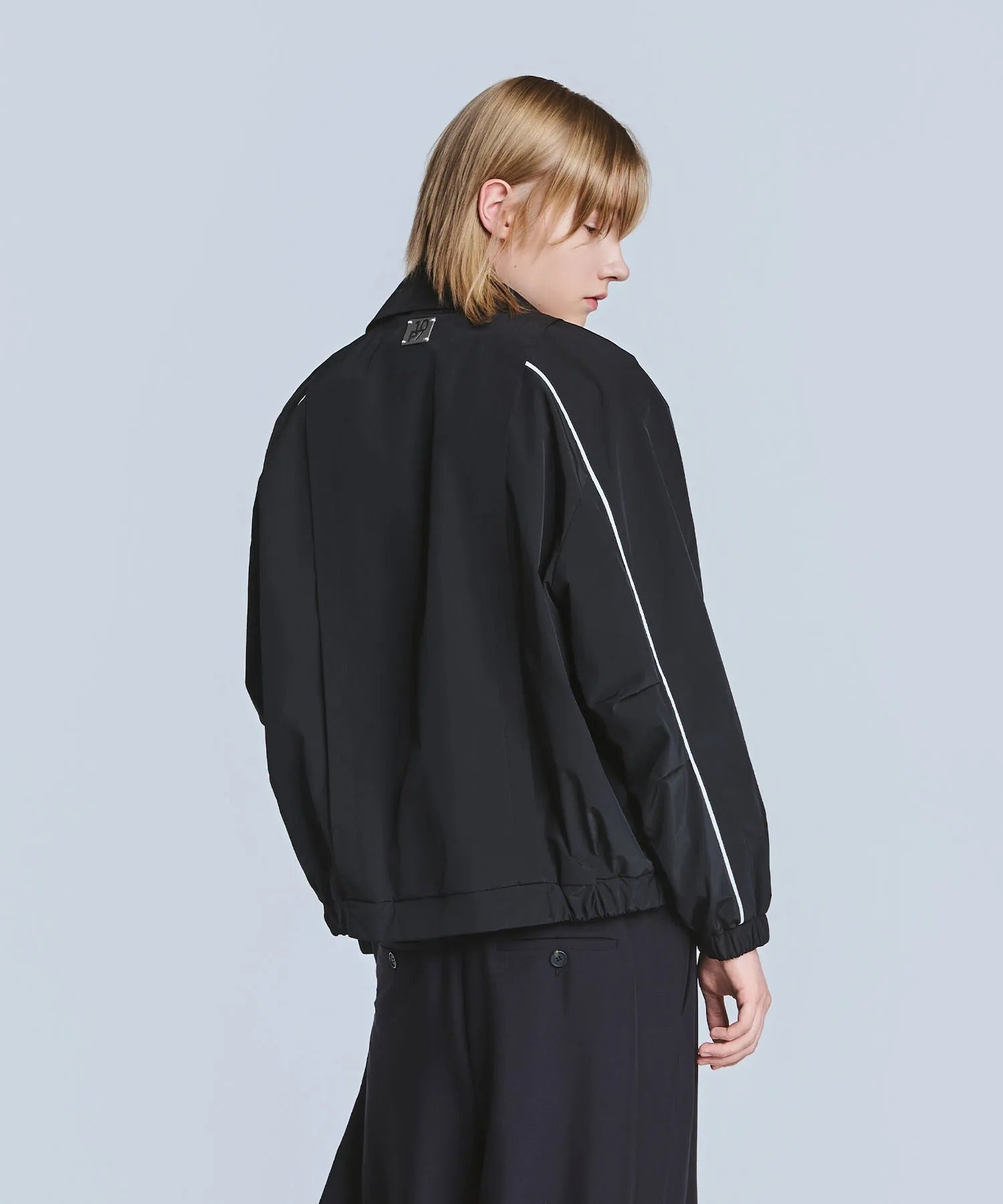 Lorra svart jacka med vita ränder