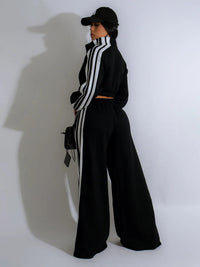 Tvådelad kostym med vita ränder