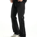 Svarta jeansbyxor med dragkedja nedtill