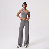 Yogadräkt med en axel och utsvängda byxor