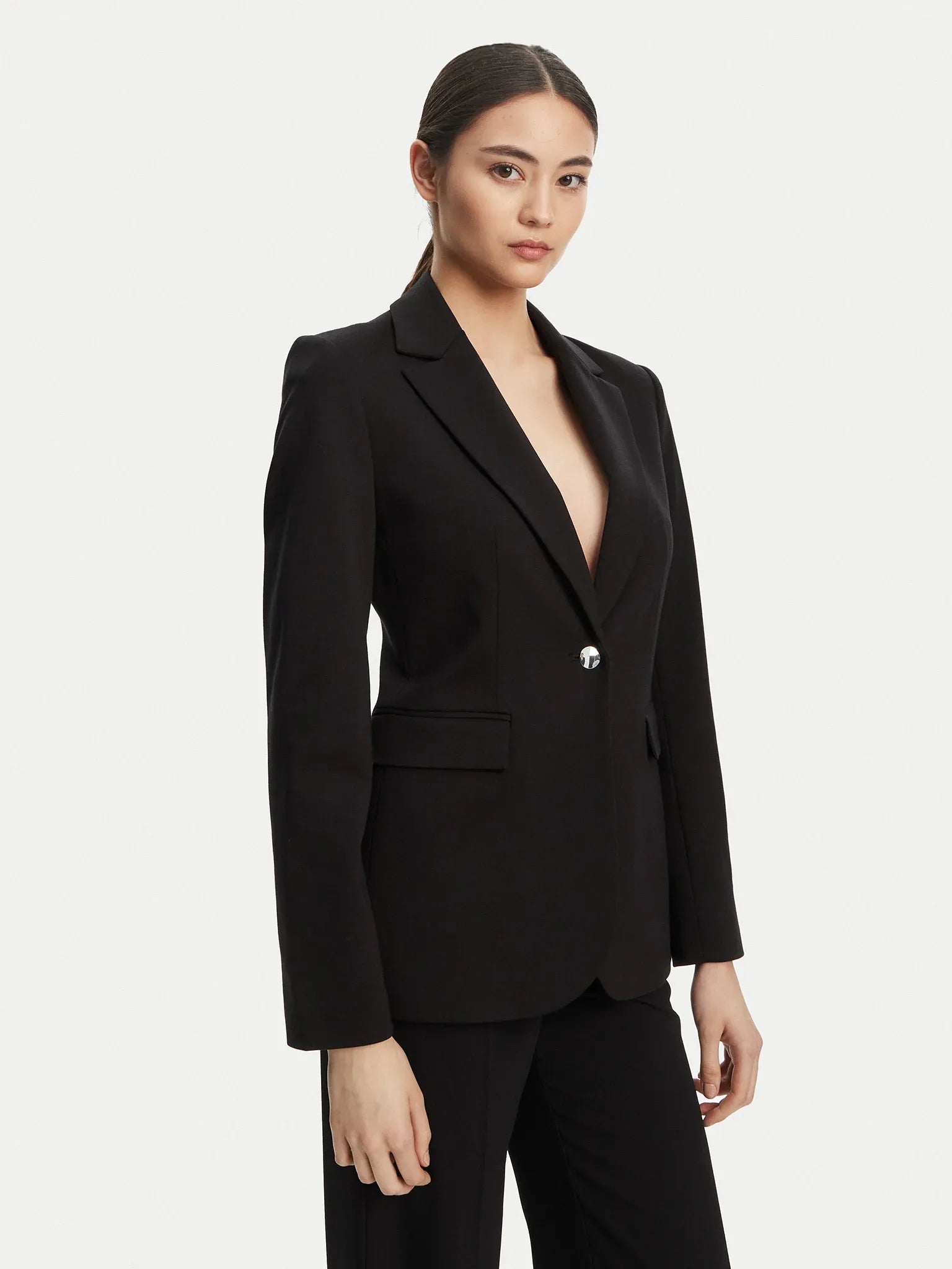 Lerra svart jacka med knapp och v-ringning