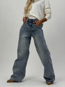 Eleonora utsvängda och glansiga denimjeans med fickor