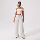 Yogadräkt med en axel och utsvängda byxor