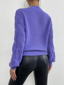 Mörkblå stickad tröja med långa ärmar