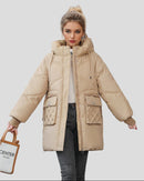 Tjock vinterjacka i bomull med huva och fickor