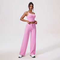 Yogadräkt med en axel och utsvängda byxor