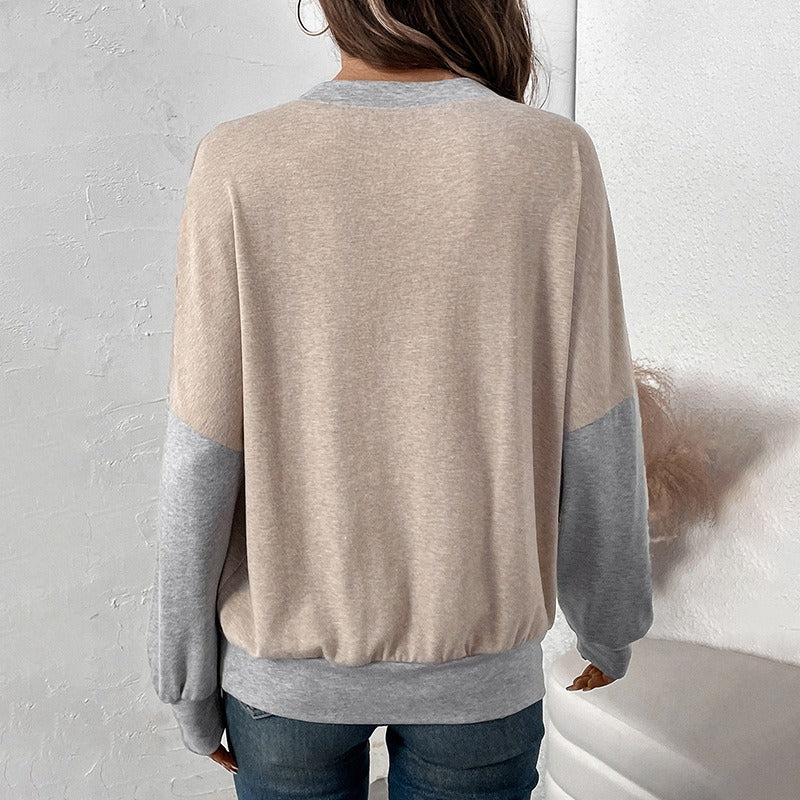 Tunn, beige tröja med rund krage