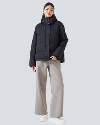 Allal jacka med dragkedja, knappar och fickor