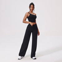 Yogadräkt med en axel och utsvängda byxor