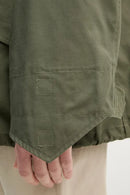 Grön jacka med dragkedja