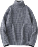 Stickad tröja med hög krage och långa ärmar