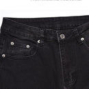 Svarta jeansbyxor med dragkedja nedtill