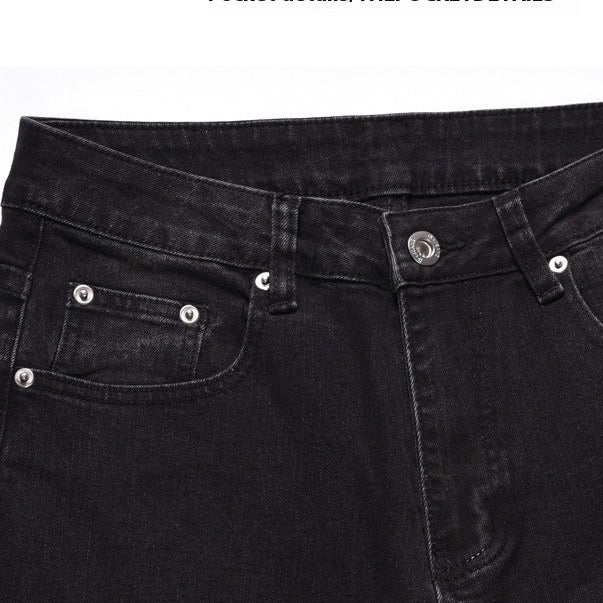 Svarta jeansbyxor med dragkedja nedtill