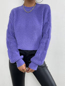 Mörkblå stickad tröja med långa ärmar