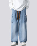 Utsvängda jeansbyxor med sidofickor