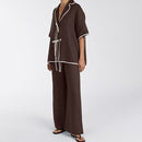 Tvådelat linneset, mörkbrunt, löst sittande, med utsvängda byxor