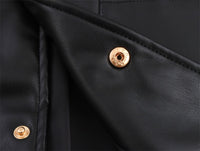 Vivi svart jacka med rund krage och enkel rad knappar