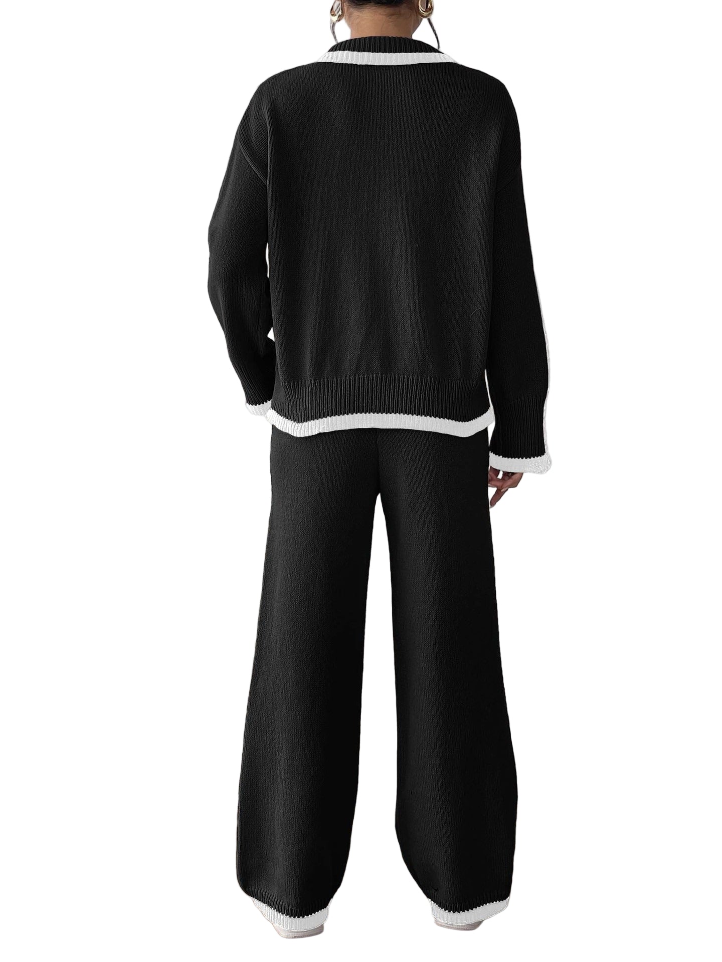 Tvådelat set med tröja och avslappnade byxor med vida ben