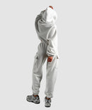 Tvådelad dräkt med fleecefoder och huva