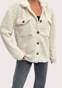 Vit jacka med slag och knappar