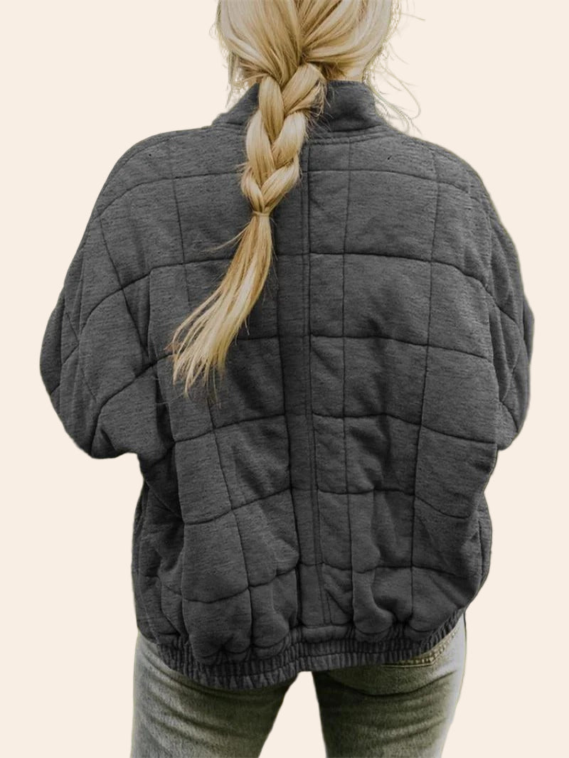 Hög kragejacka med dragkedja, fickor och rutigt mönster