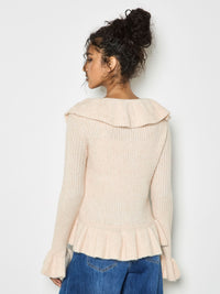 Alla rosa stickad blus med volanger