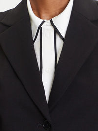 Vivi jacka med dragkedja, knapp och v-ringning