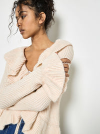 Alla rosa stickad blus med volanger