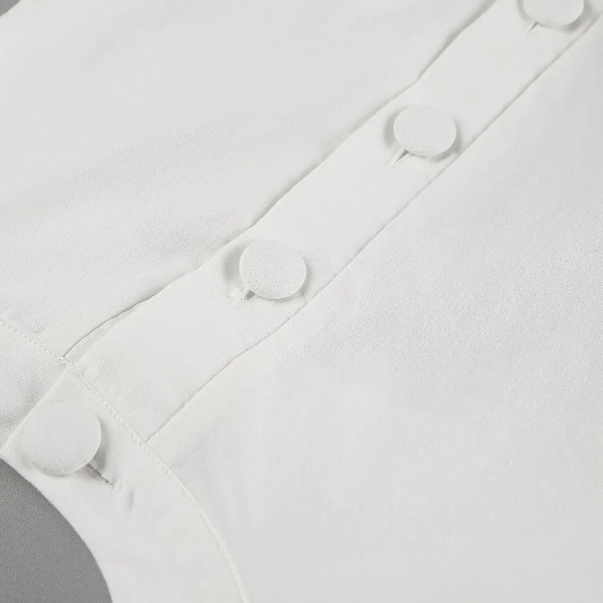 Vitt tvådelat set, lång linnekjol och ärmlös jacka