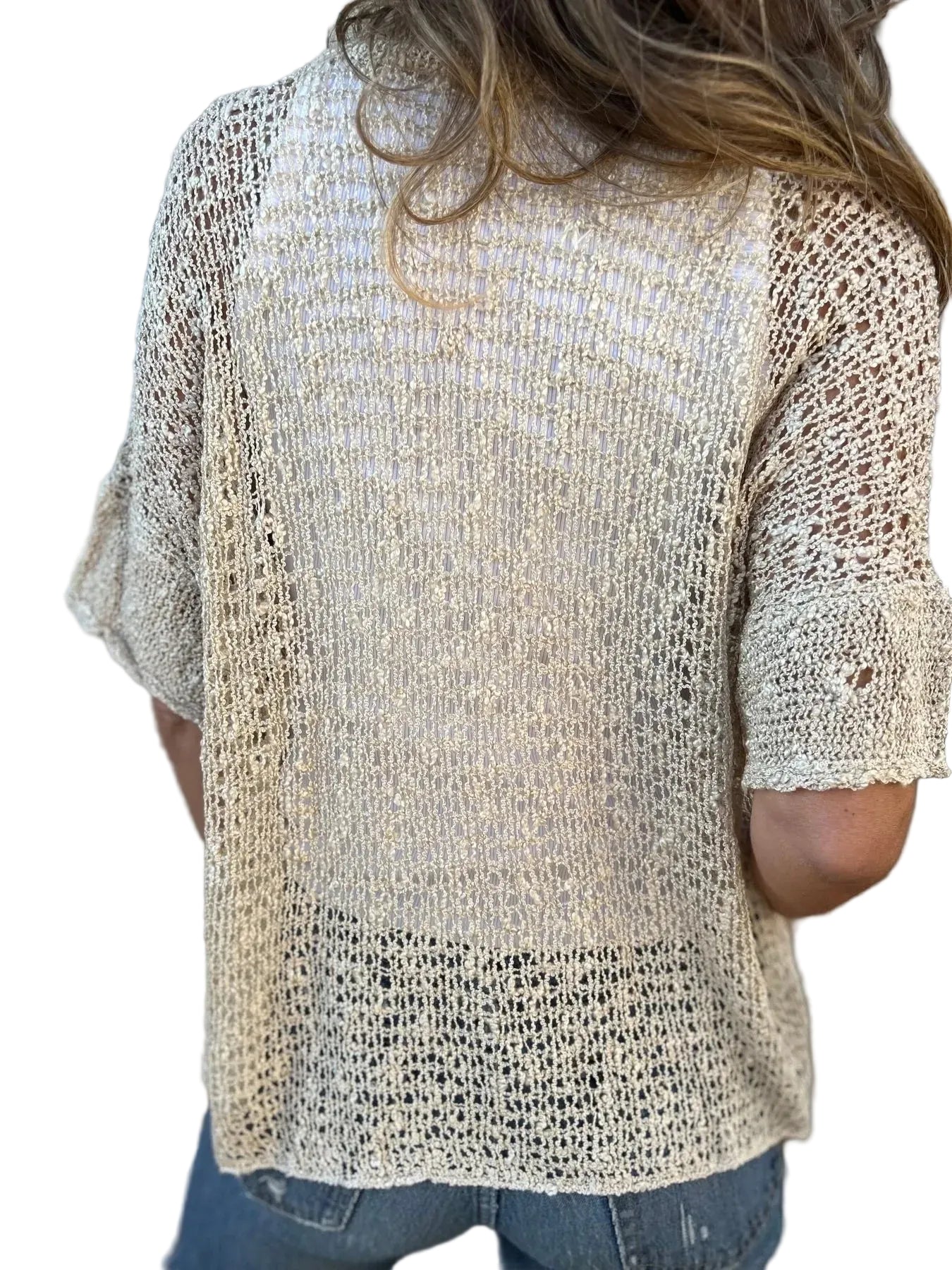 Kofta med halvärmar och V-ringning, med en knapp och stickad