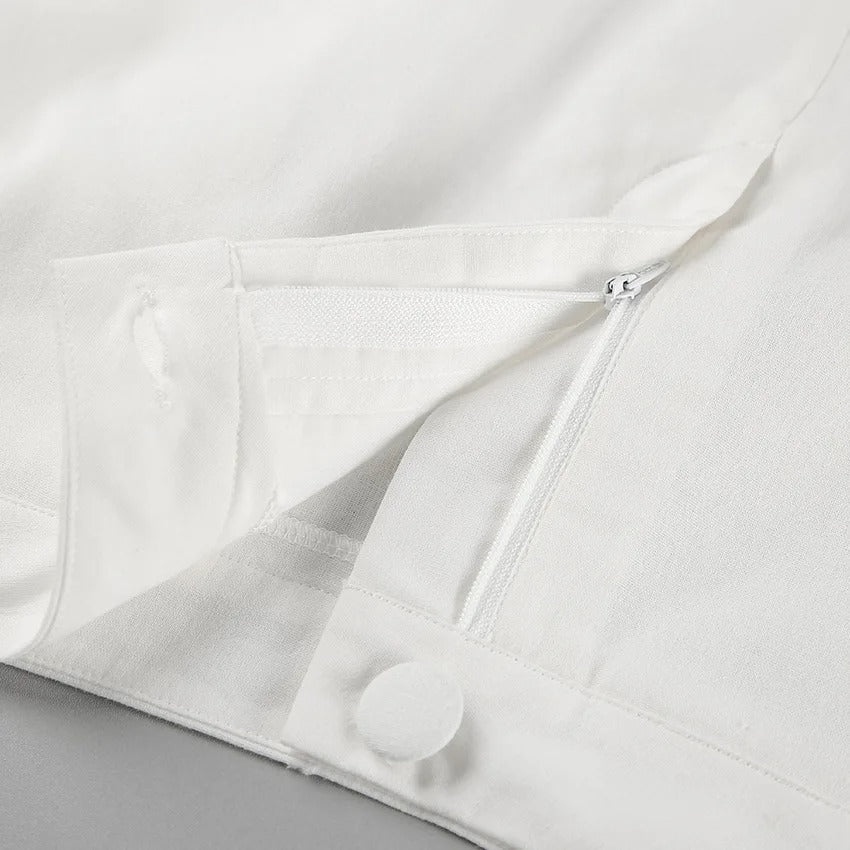 Vitt tvådelat set, lång linnekjol och ärmlös jacka