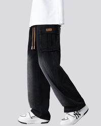 Utsvängda jeansbyxor med sidofickor