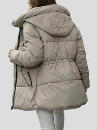 Grå quiltad jacka med huva, fodrad och justerbar midja