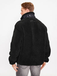 Svart blus med dragkedja från Robi