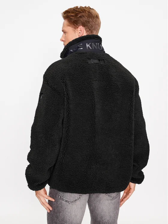 Svart blus med dragkedja från Robi