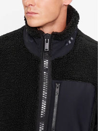 Svart blus med dragkedja från Robi